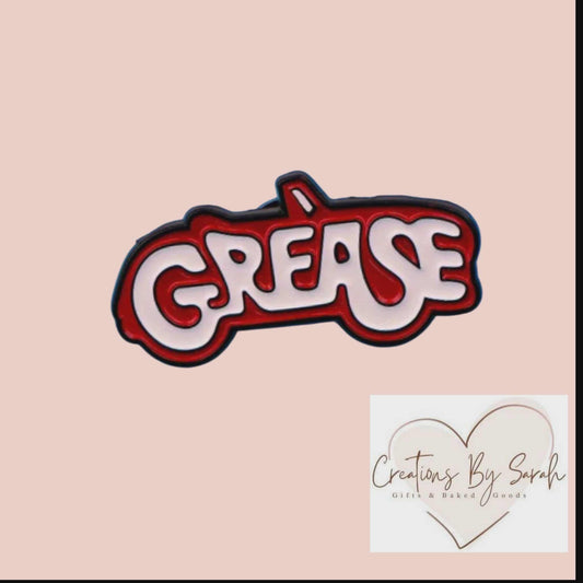 Grease Pin Badge